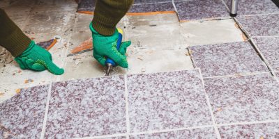 Dismantling tile floors to repair